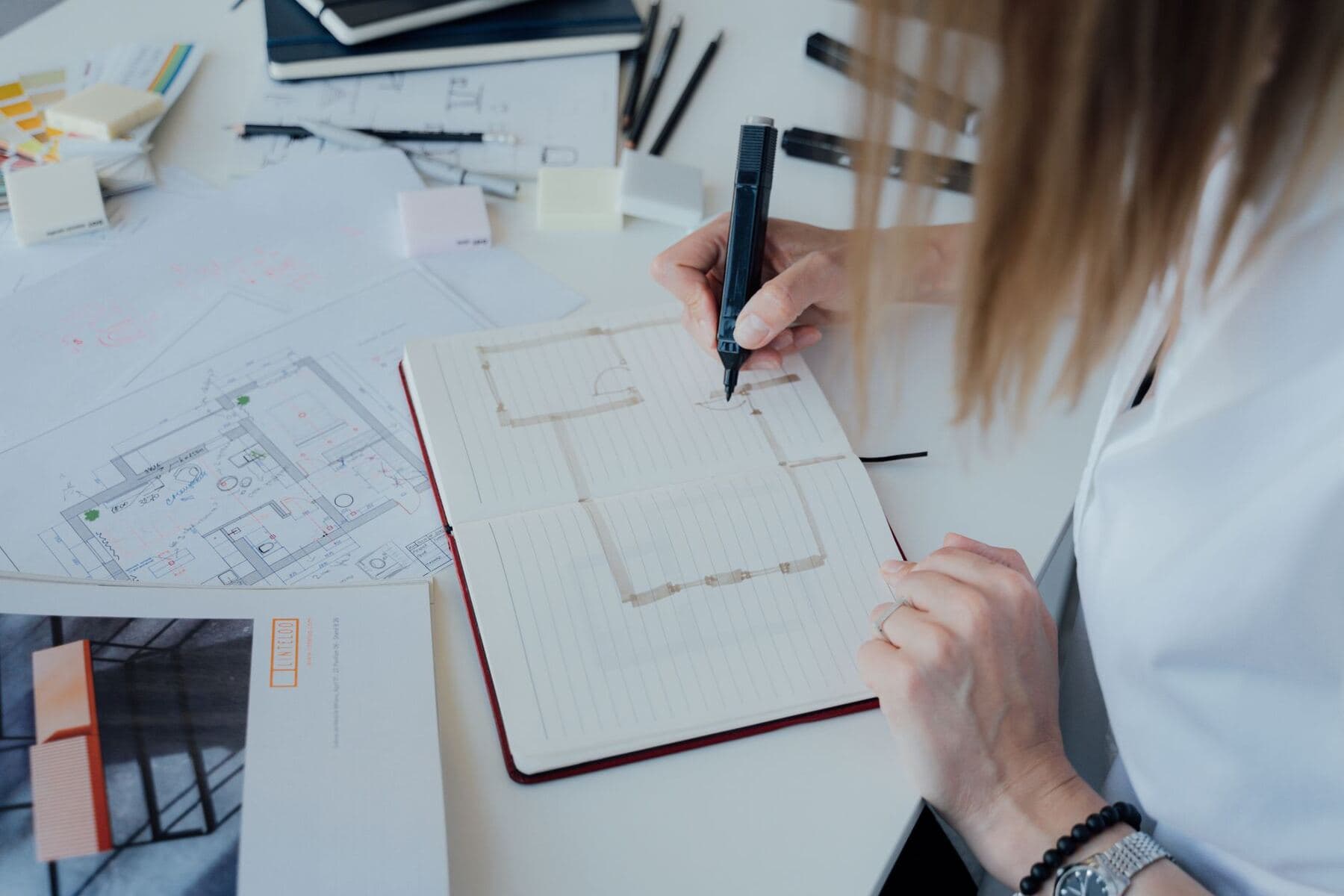 Designer working across many layouts