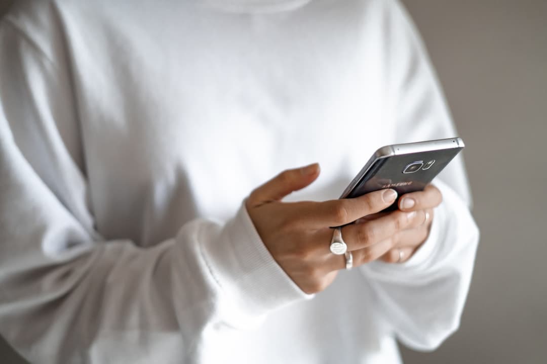 Speaking to a voice assistant on a phone, the conversational layer Pinterest Assistant sits in