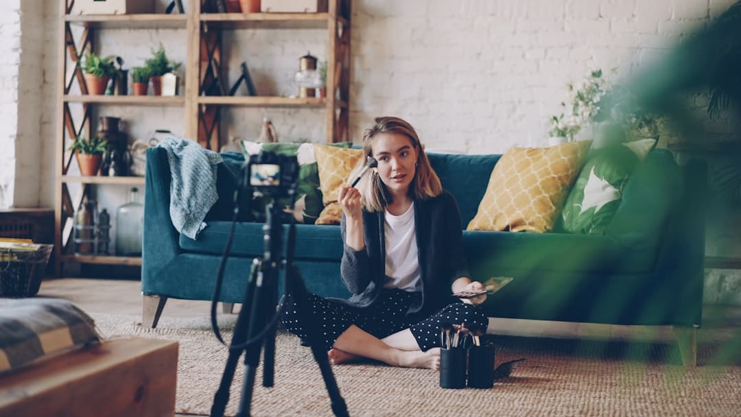 A small business owner photographing a product at home to make original pins