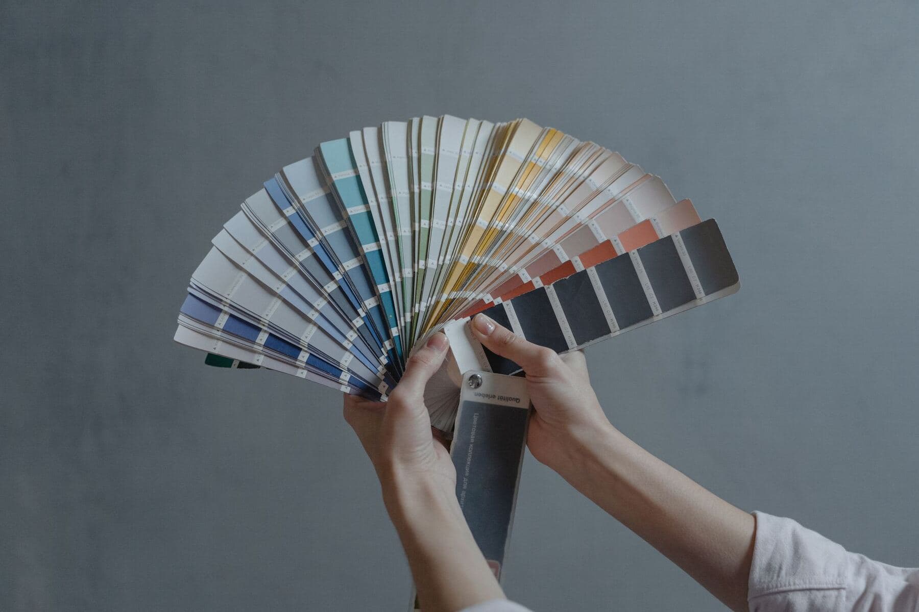 Colour swatches and design tools on a desk