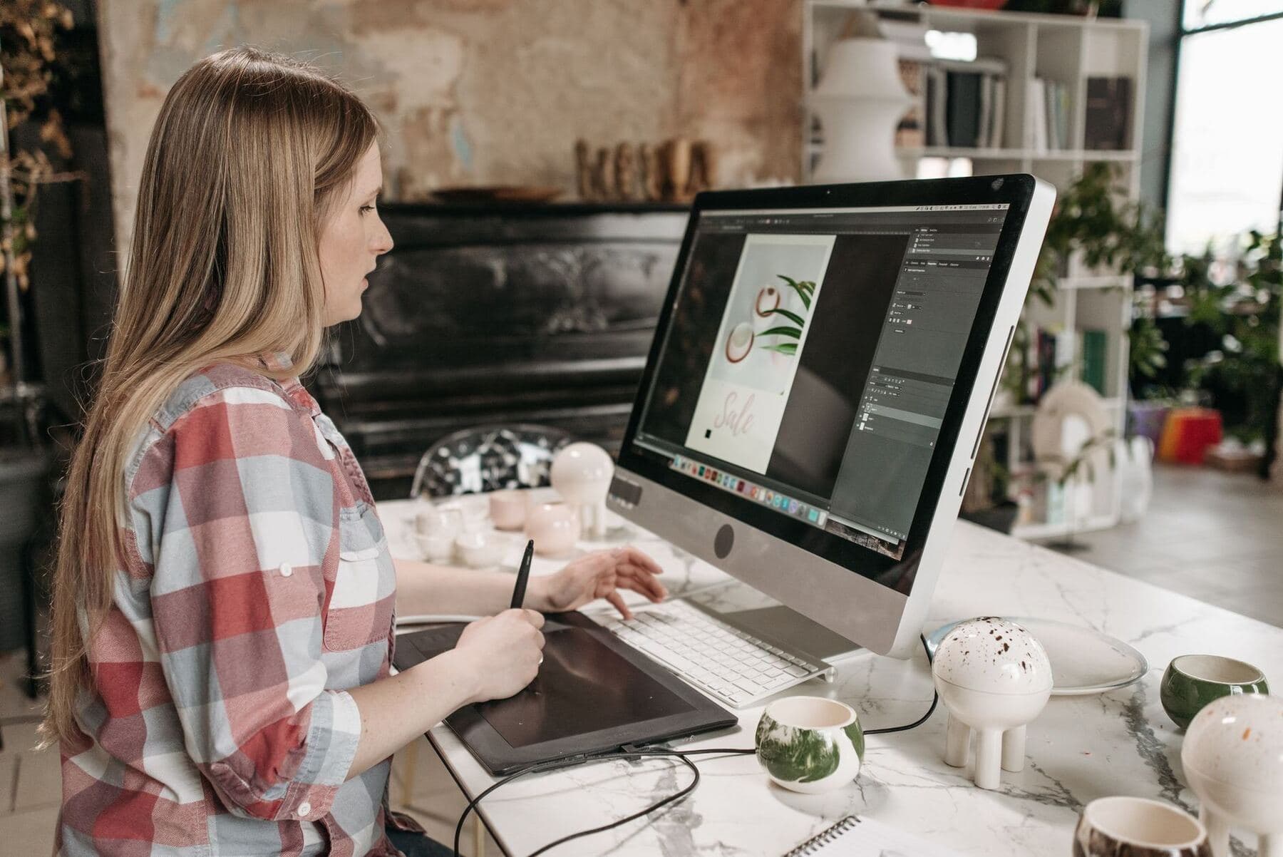 Graphic designer working at a computer