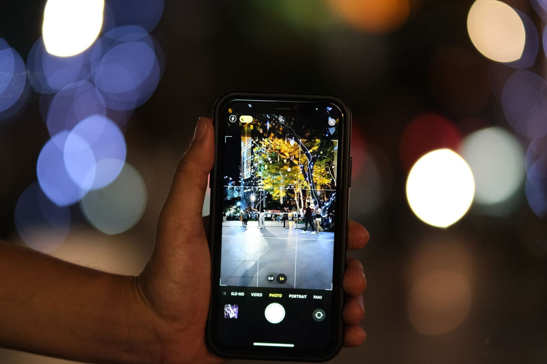Hands using a smartphone camera