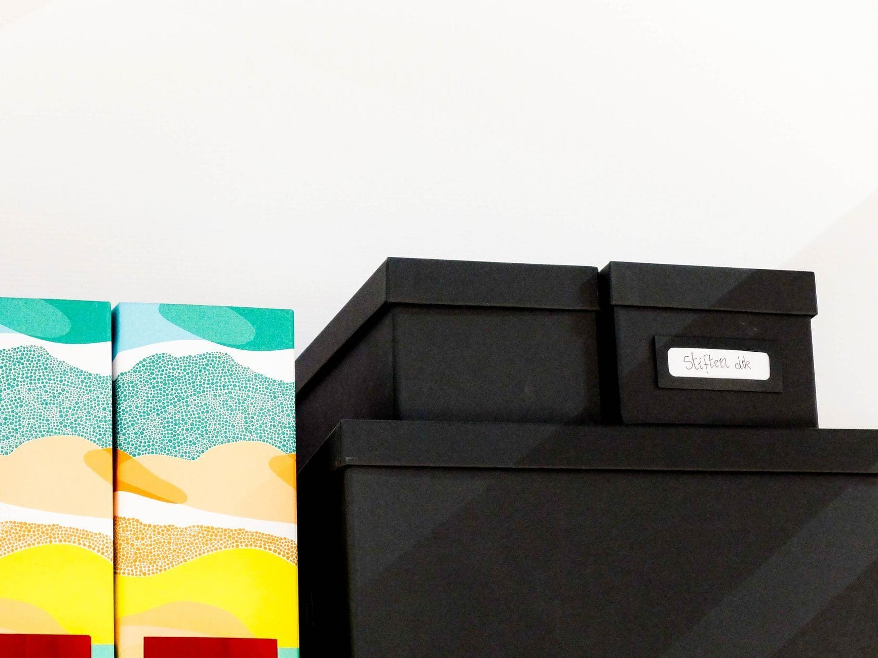 Labelled storage boxes on shelves