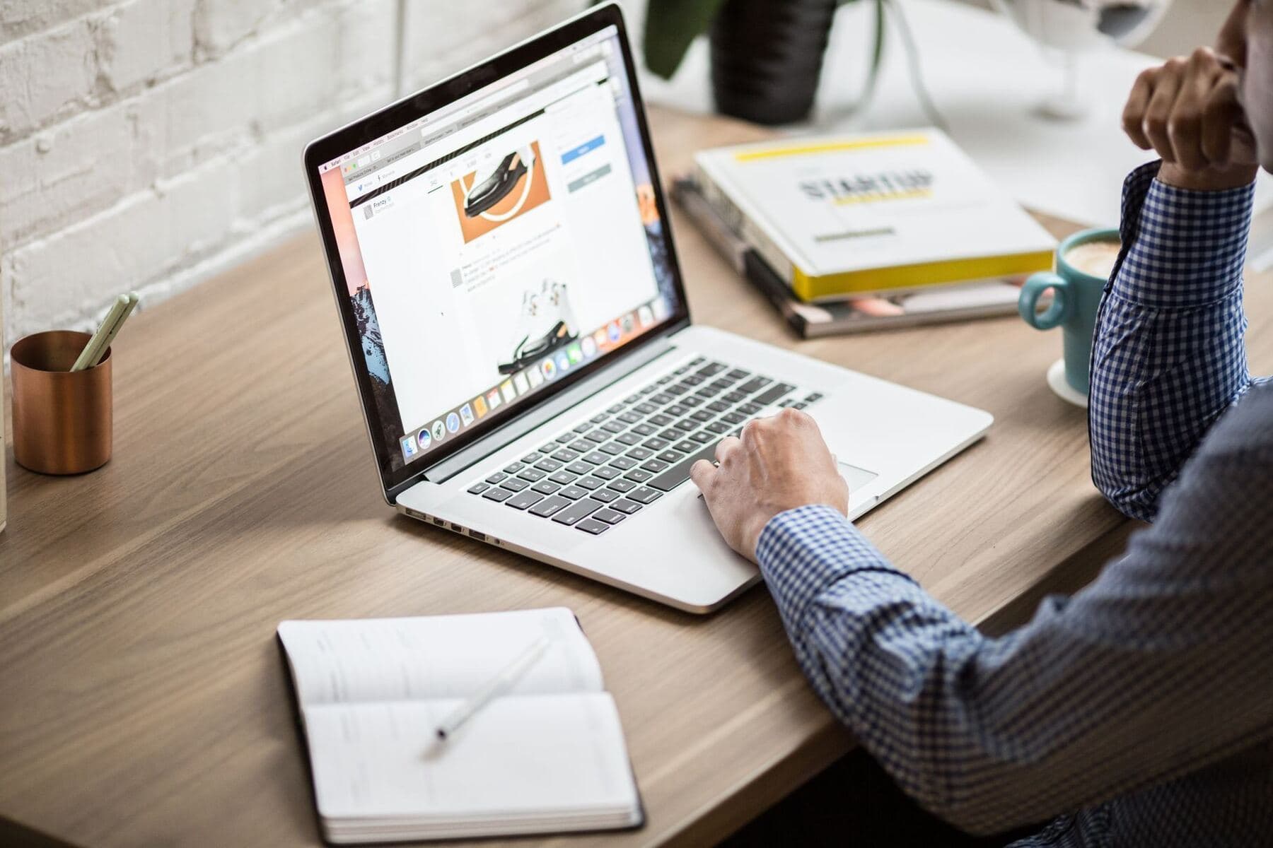 Social media manager at a desk