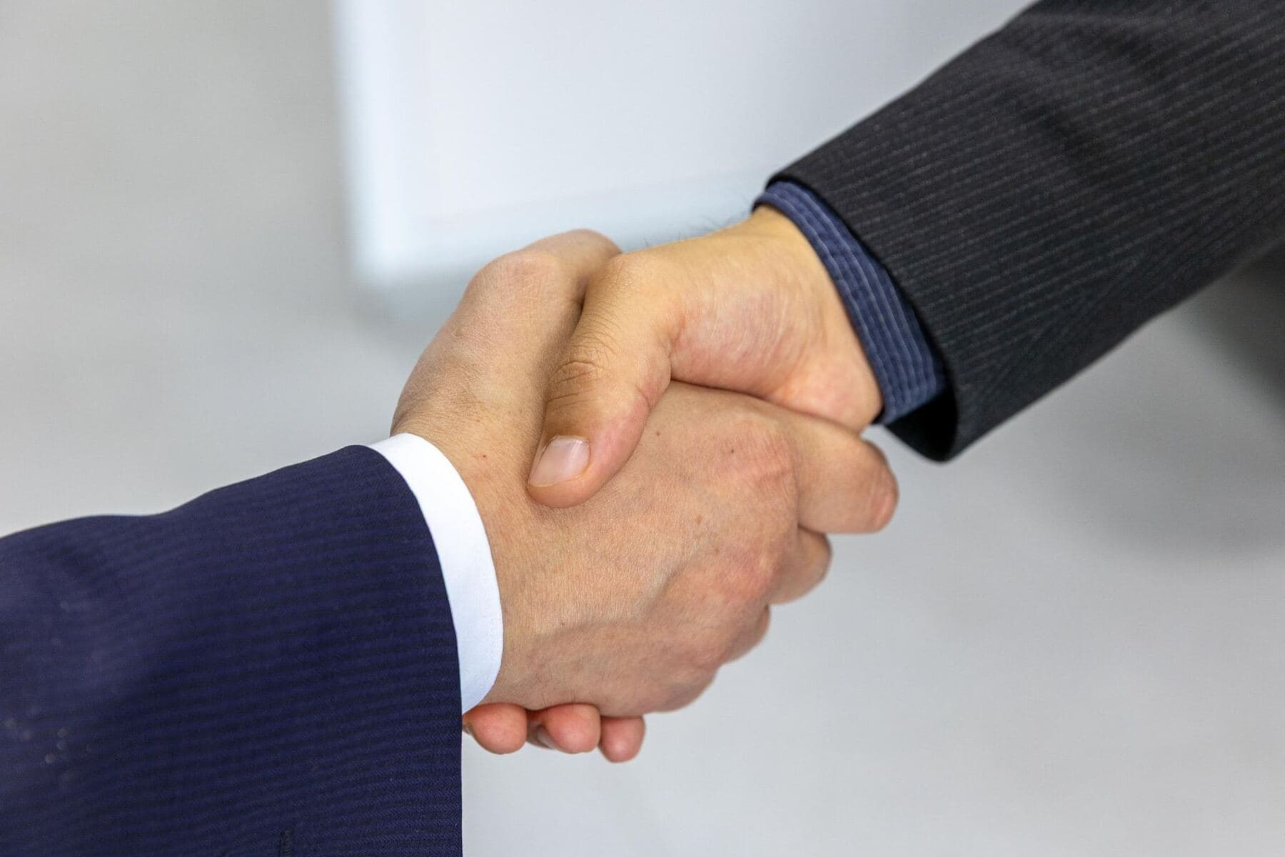 Business handshake in a meeting