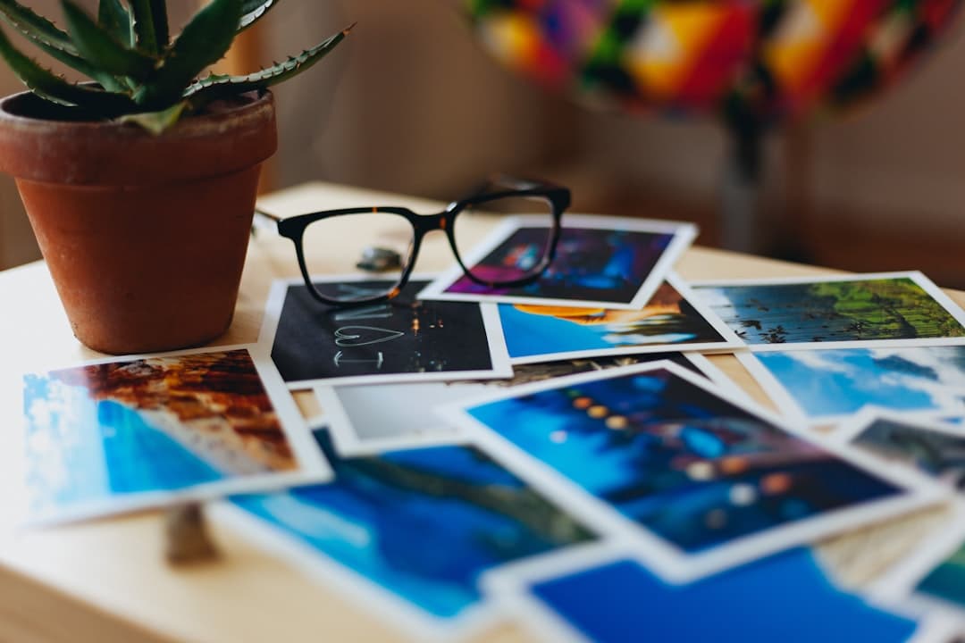 Photo prints spread across a desk, each a distinct image rather than a recolour