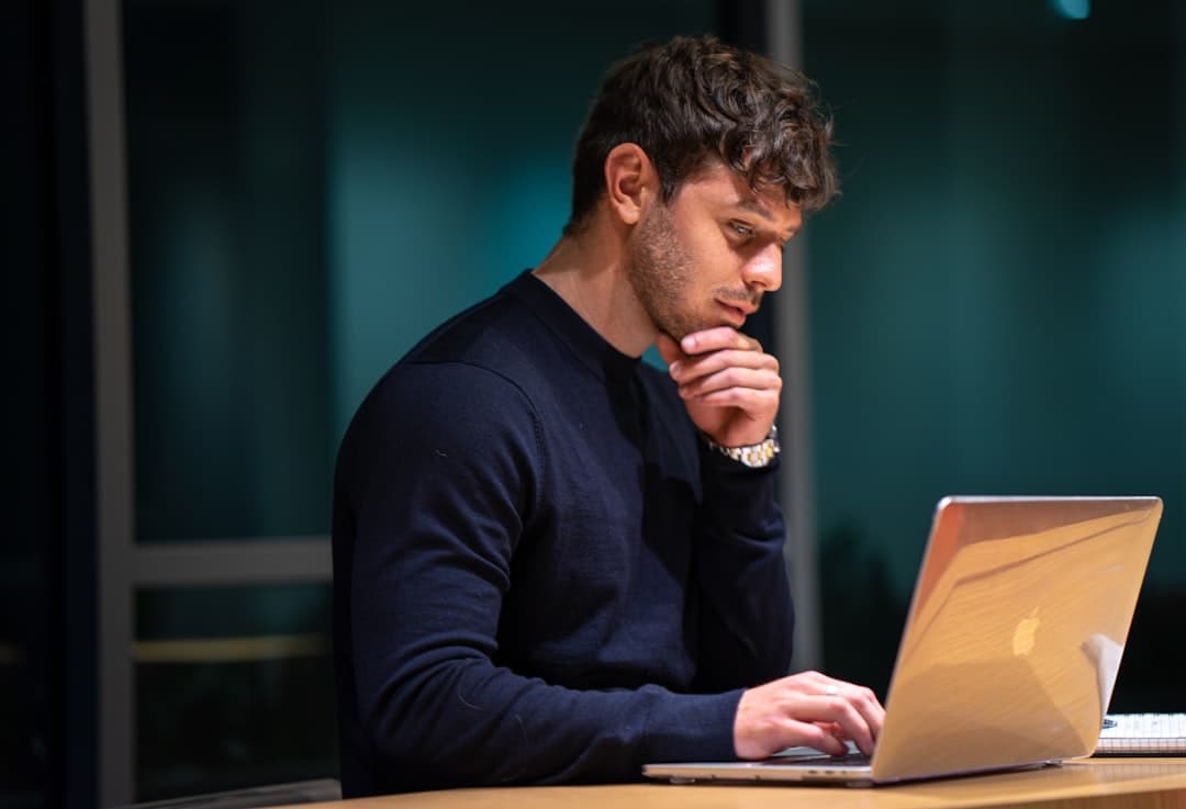 Working through a traffic drop at a desk, comparing Pinterest and site analytics