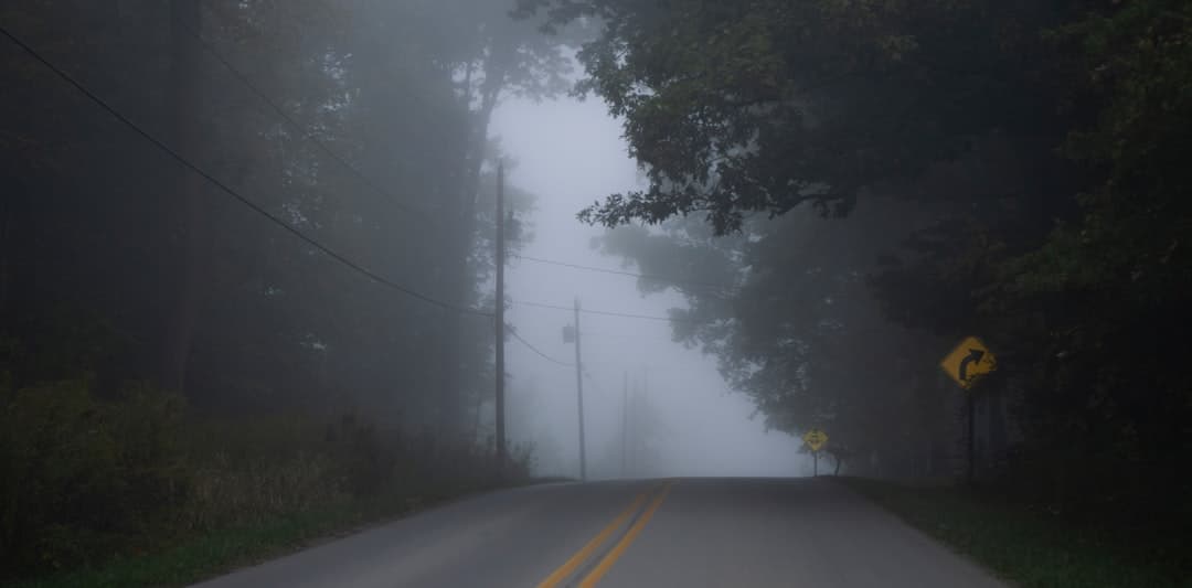 An empty road disappearing into fog, the view when distribution falls away
