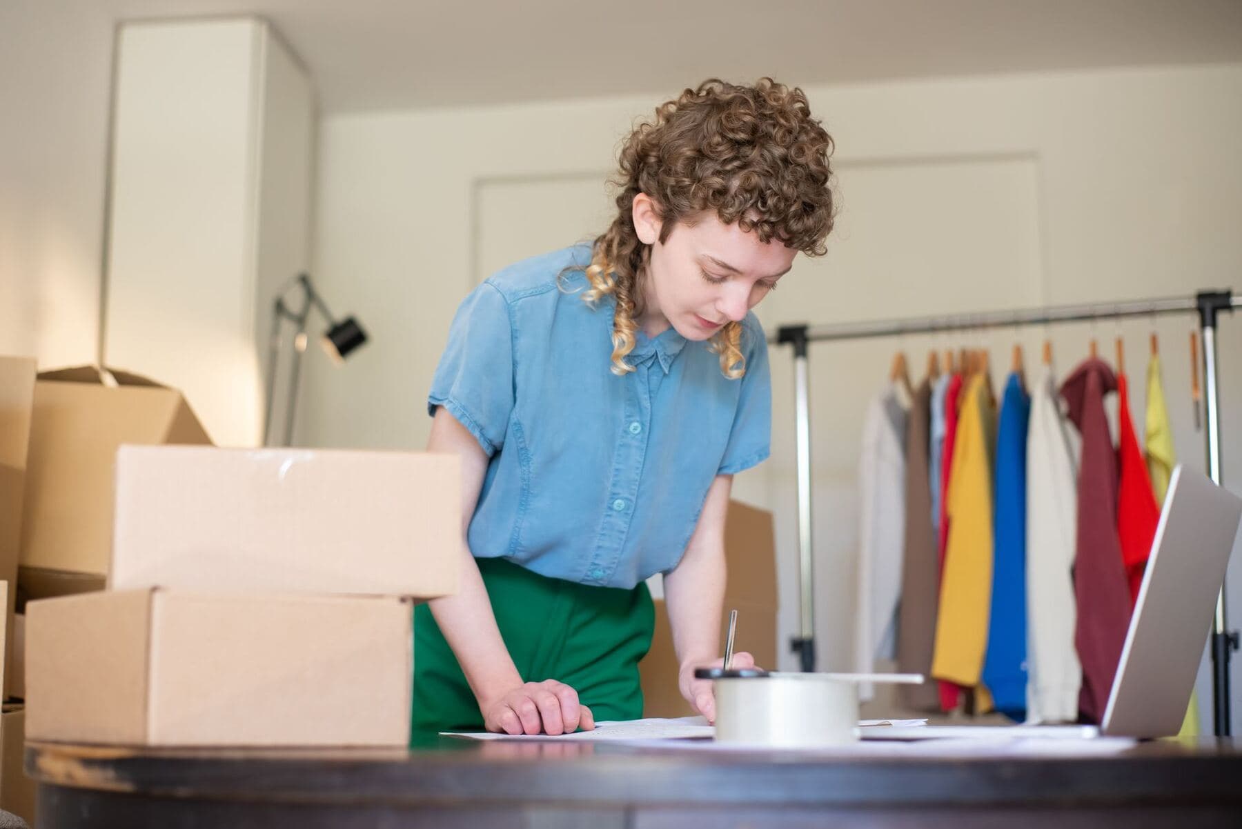 Packing shop orders at a desk